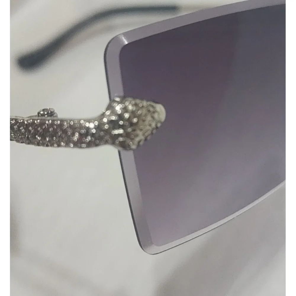 Womens silver snake embellished rimless fashionable sunglasses uv protection